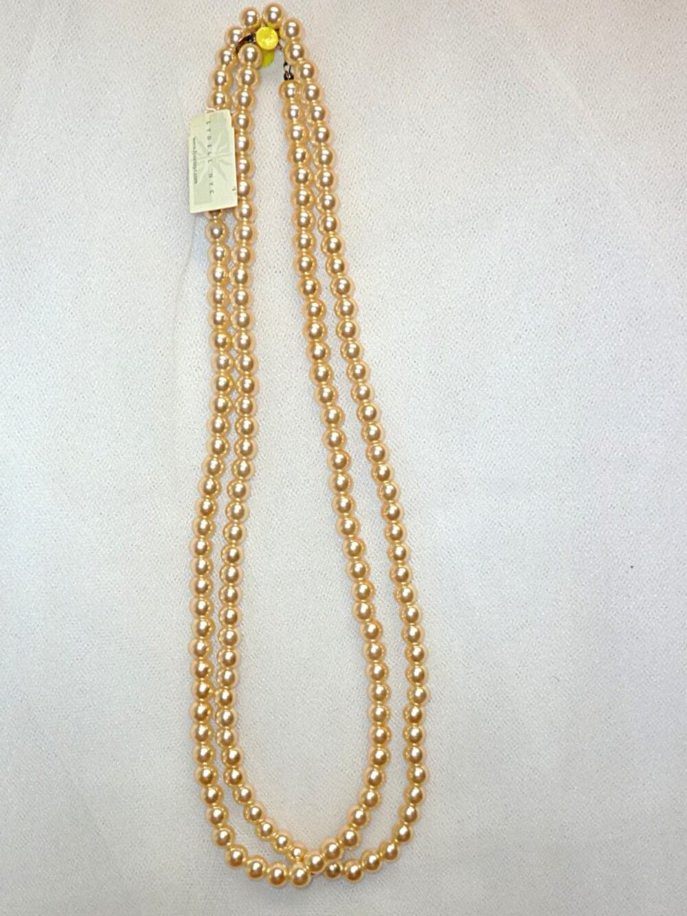 Lydell NYC 7.5 inch Ivory Faux Pearl Necklace 46 inch long. (With label.)